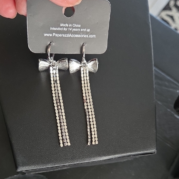 Paparazzi Silver Rhinestone Bow Earrings - Picture 3 of 4